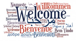 Welcome phrase in different languages. Word clouds concept.
