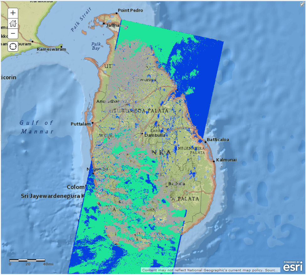 Flood extent map over Sri Lanka from Landsat-8 data. Open water (including oceans) is blue, clouds with open water believed to be underneath are green, and areas completely obscured by clouds are grey.